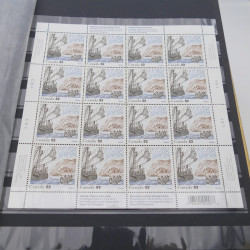 Lot de feuillets de timbres neufs du monde en un album.