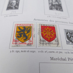 Vrac de timbres du monde neufs et oblitérés en un carton.